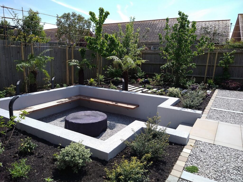 A garden design with sunken Fire Pit Area by Diana Arnold Design